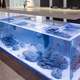 Illustration for article titled There's a Miniature Ocean Trapped Inside This Kitchen Island